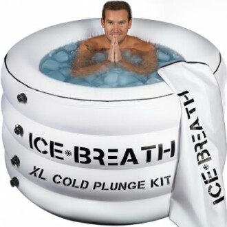 Person in an inflatable ice bath labeled 'Ice Breath XL Cold Plunge Kit'.