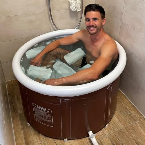 Man sitting in an ice bath